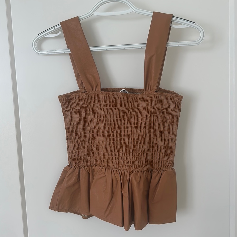 Boutique Faux Leather Peplum tank!